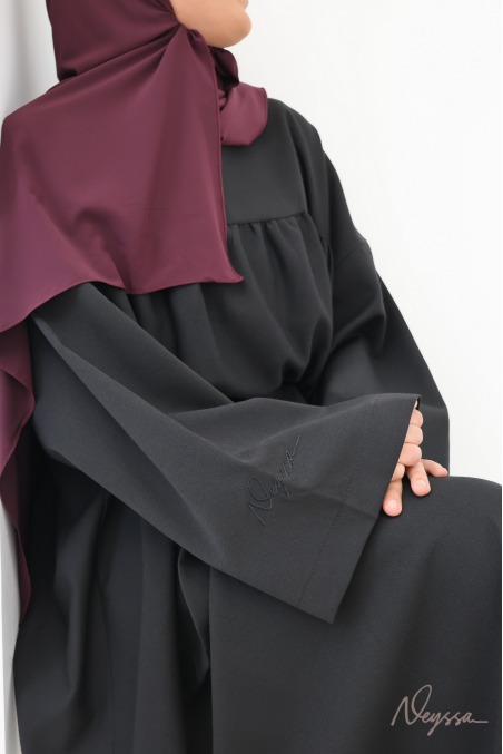 Ensemble tunique et jupe longue évasée noir
