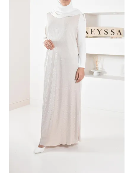 Long pleated bottom of dress under satin dress to complete its outfits