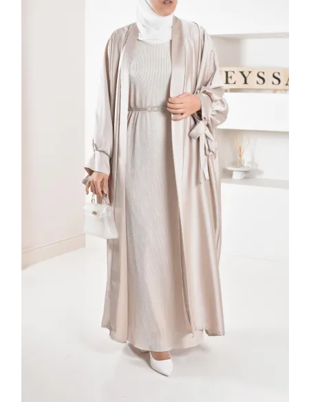 Long pleated bottom of dress under satin dress to complete its outfits