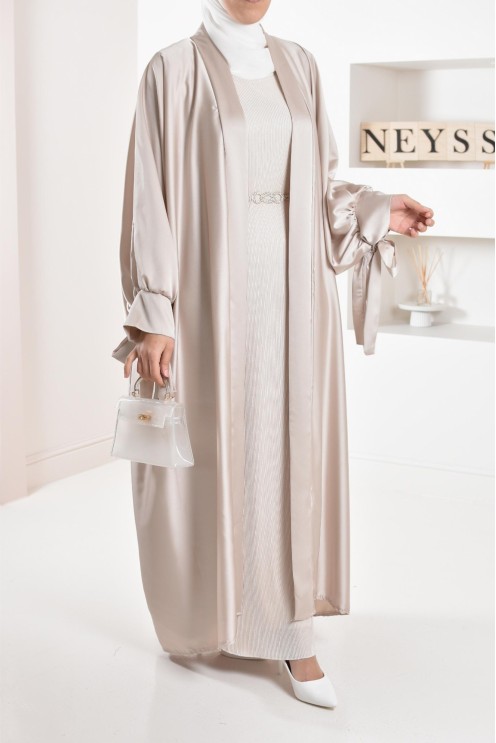 Long pleated bottom of dress under satin dress to complete its outfits