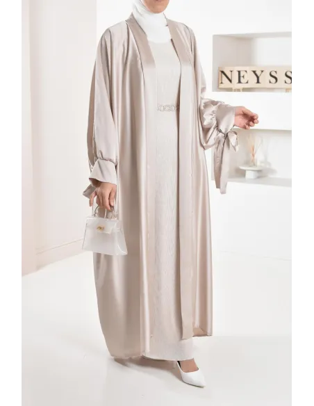 Long pleated bottom of dress under satin dress to complete its outfits