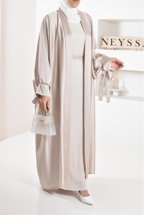 Long pleated bottom of dress under satin dress to complete its outfits