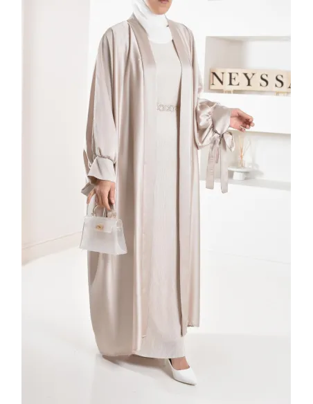 Long pleated bottom of dress under satin dress to complete its outfits