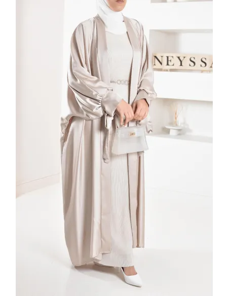 Long pleated bottom of dress under satin dress to complete its outfits