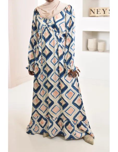 Robe longue bleu en satin évasée avec motifs tendances, parfait pour les femmes voilées, collection été