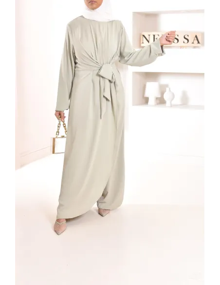 1-piece green jumpsuit: integrated tunic and palazzo, modest outfit.