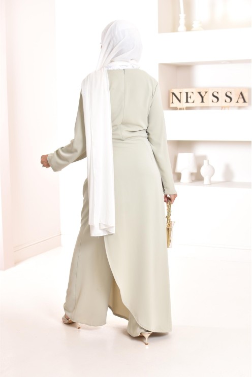 1-piece green jumpsuit: integrated tunic and palazzo, modest outfit.