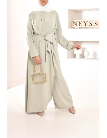 1-piece green jumpsuit: integrated tunic and palazzo, modest outfit.
