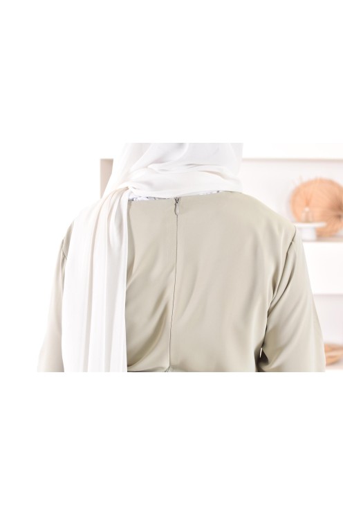 1-piece green jumpsuit: integrated tunic and palazzo, modest outfit.