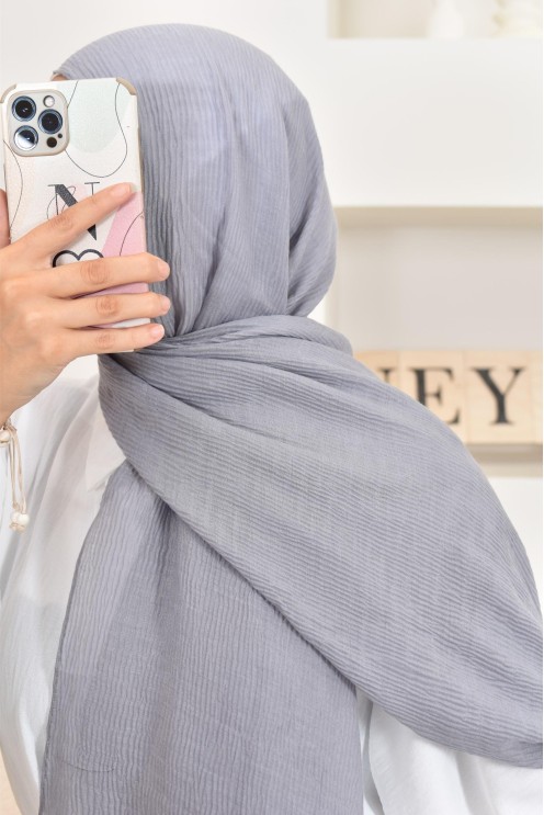 Un hijab féminin à texture longue à la fois économique et idéal pour une mode discrète.