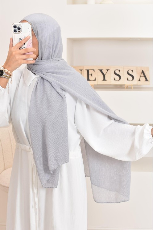 Un hijab féminin à texture longue à la fois économique et idéal pour une mode discrète.