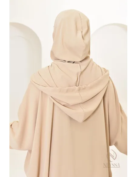 Robe de prière avec son hijab intégré, peut se porter en tenue d'extérieur.