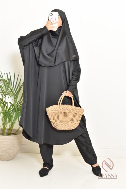 Black burkini with integrated swim khimar, loose-fitting and water-resistant
