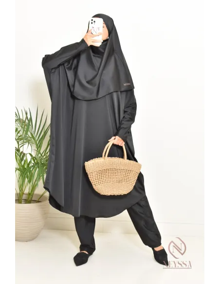 Black burkini with integrated swim khimar, loose-fitting and water-resistant