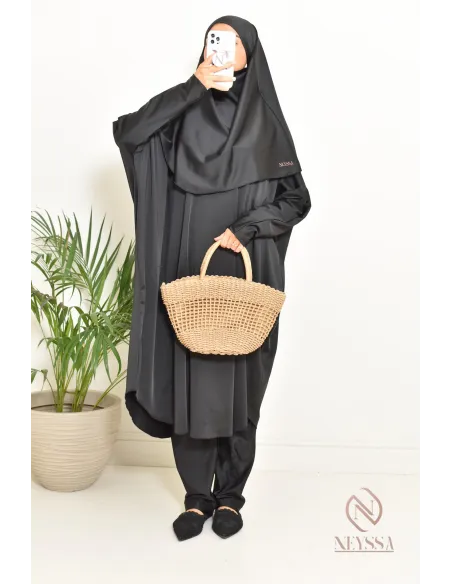 Black burkini with integrated swim khimar, loose-fitting and water-resistant