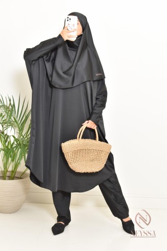 Black burkini with integrated swim khimar, loose-fitting and water-resistant